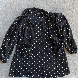 Sheer top with neck tie. 3/4 sleeve